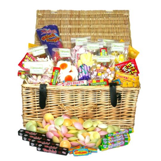 a genuine quality wicker hamper containing our very best in retro sweets. Flying Saucers, Fizz Wizz, Drumsticks, Dolly Mix, Shrimps and too many more sweets to name