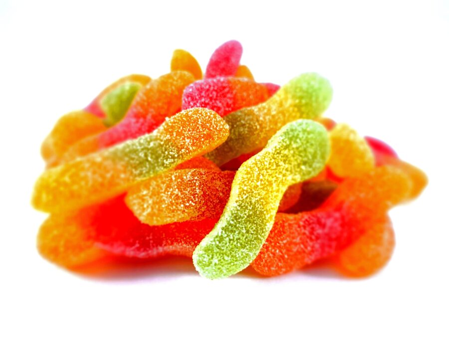 Sour worm sweets with fizz